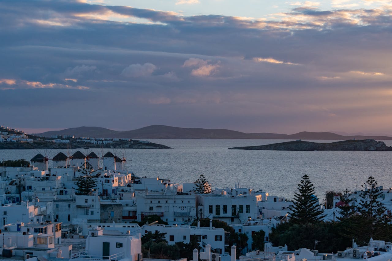White Houses on Seashore on Sunset